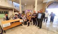 استقرار میز خدمت شبکه بهداشت و درمان شهرستان فامنین در مکان نماز جمعه بمناسبت هفته دفاع مقدس با حضور مهندس یوسفی مدیر بیمارستان امام حسن مجتبی (ع)فامنین